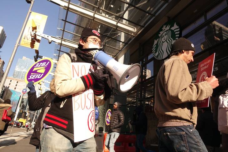 A photo of Starbucks workers striking in Midtown Thursday